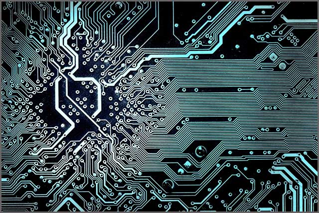 A dark-coloured printed circuit board A dark-coloured printed circuit board