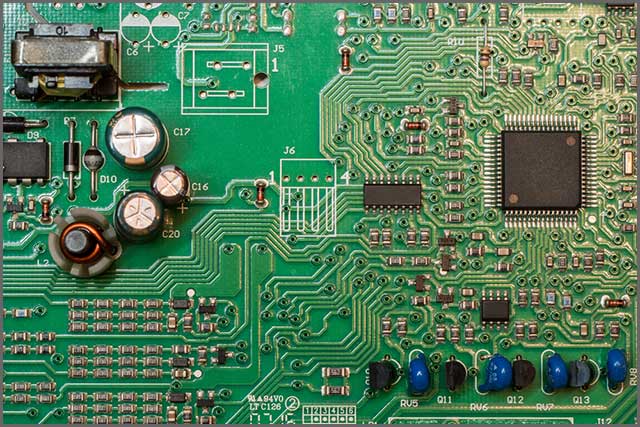 A multilayer PCB with components and microcontroller