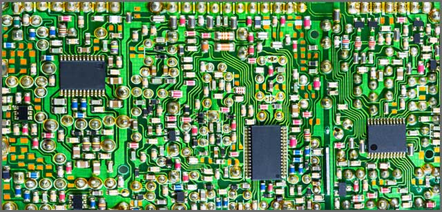 Components on a circuit board. All of these expand when their dielectric layers are heated.