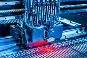 Close up of a surface mounting machine