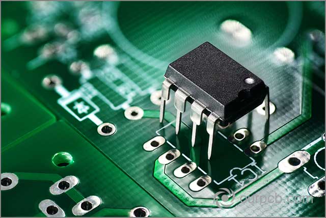 Electronic chip components on green printed circuit board