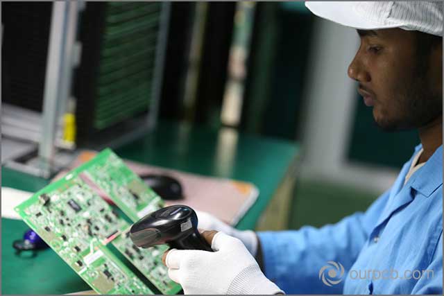 A technician conducting various inventory management techniques on a PCB