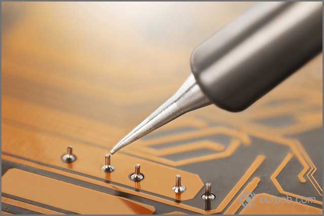 Soldering an electronic circuit board