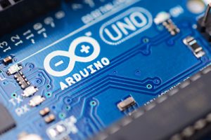 It illustrates a close-up of Arduino circuit board