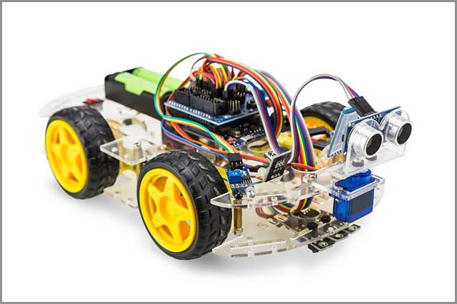It depicts a correctly assembled robotic car prototype using Arduino circuit board