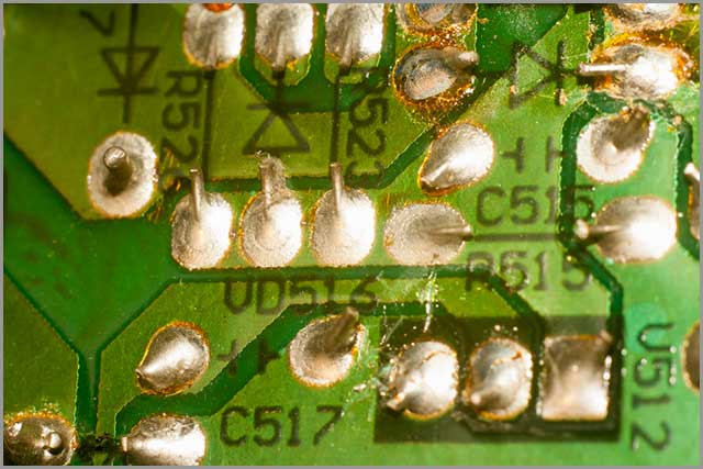 A solder joint defect on a PCB