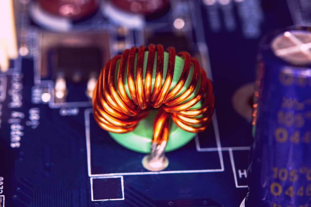 An inductor with copper coils wrapped around a core