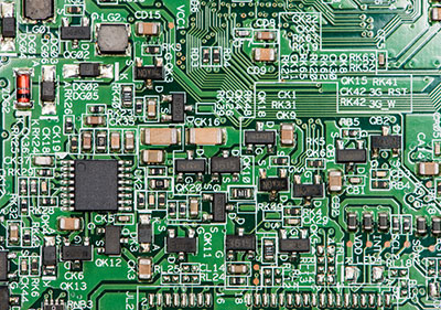 A PCB with multiple electronic components attached