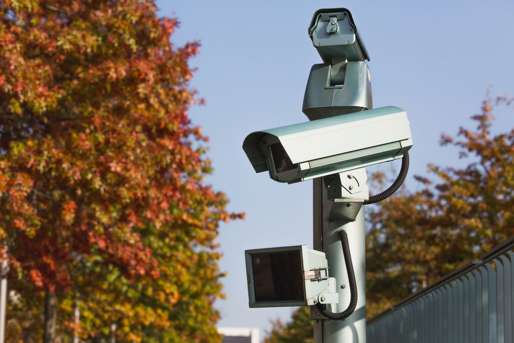 Surveillance camera with motion sensor.