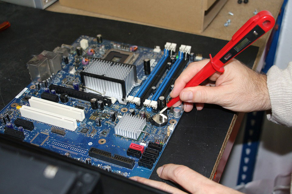 Engineer testing a PCB