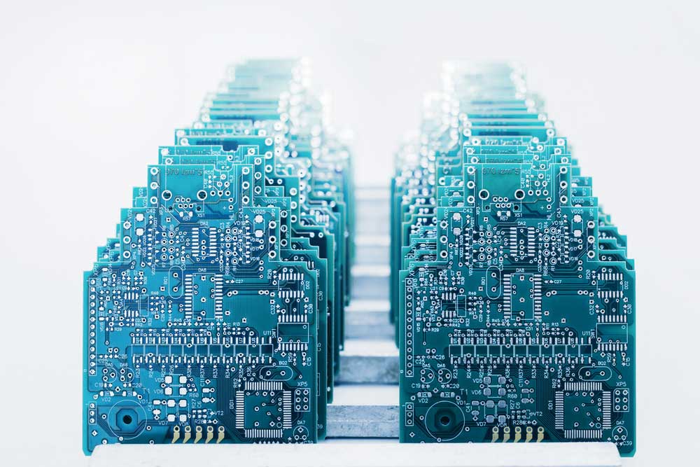 A set of circuit boards stacked in front of each other