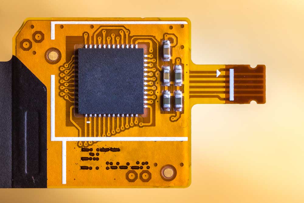 A flexible circuit with a stiffener