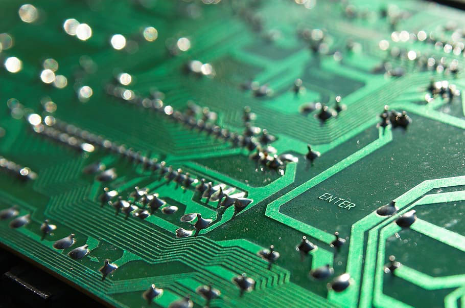 The back of a green PCB