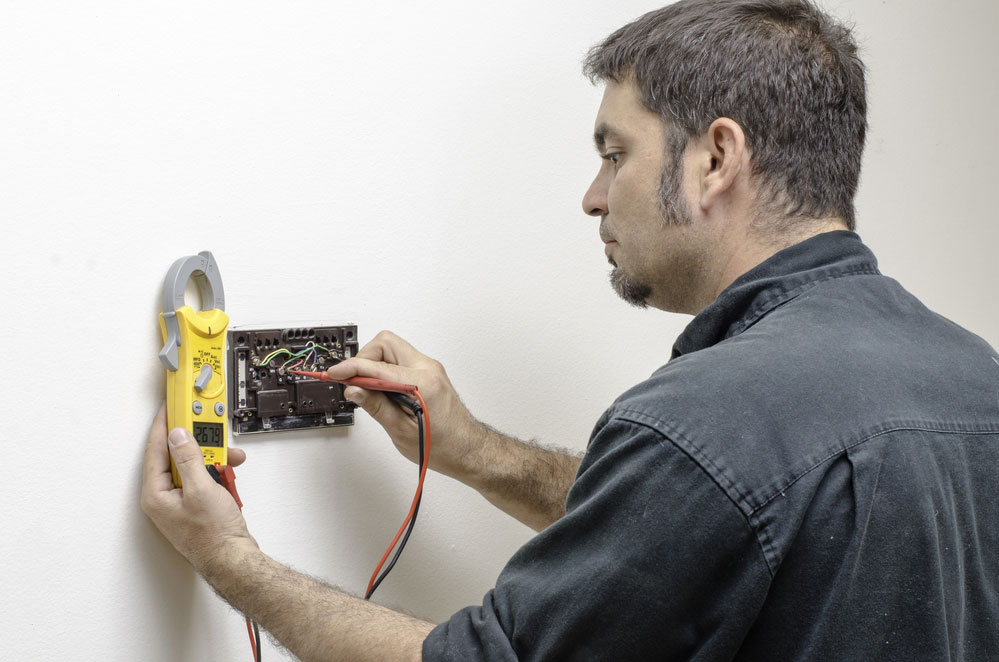 A Technician Working on an Electrical Appliance