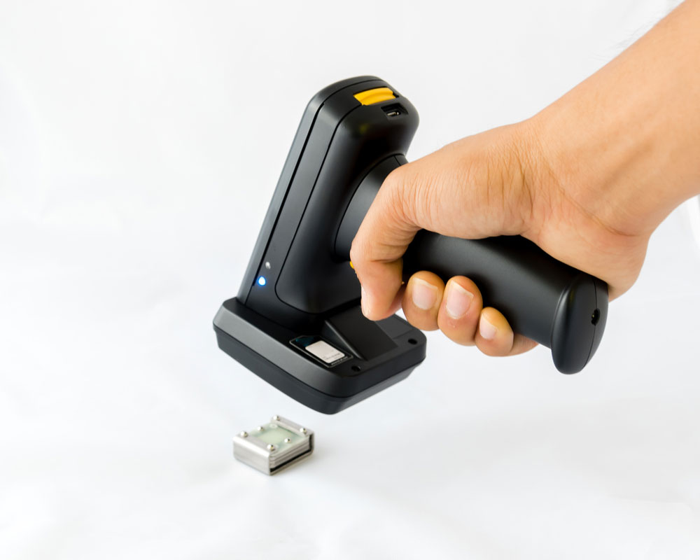a bar code scanner in use