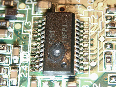 A faulty IC chip on a PCB