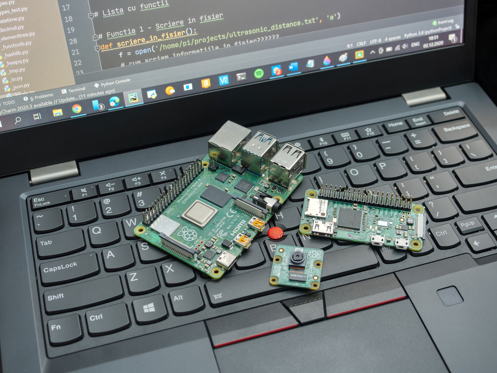 Raspberry Pi Zero W, 4 Model-B, and sensors on a laptop