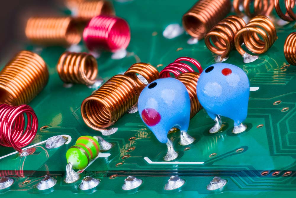 A PCB with multiple ferrite coils assembled on it