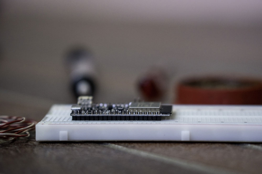 Microcontroller with press-fit pins connected to the breadboard