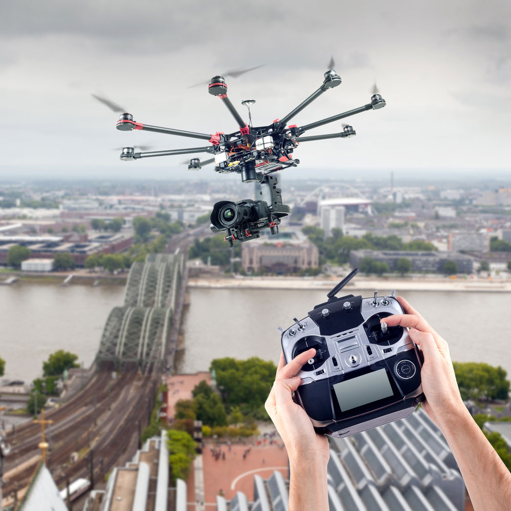 Man Controls the Flying Drones