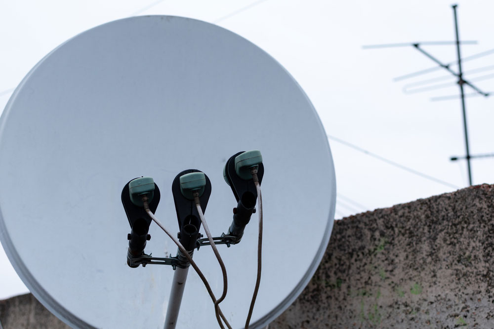 A satellite dish for converting analog-digital signals
