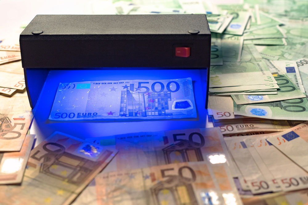 Fake money UV sensor detection system