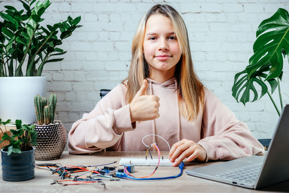 Young girl with serially connected Arduino Project