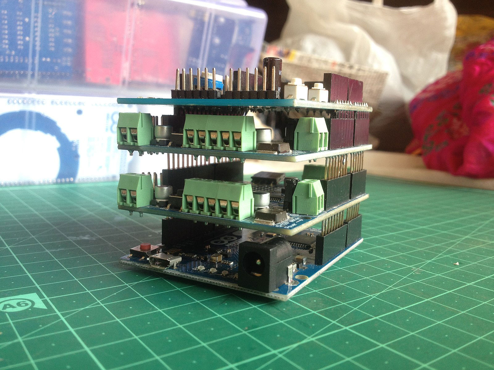 An Arduino board with multiple shields stacked on it