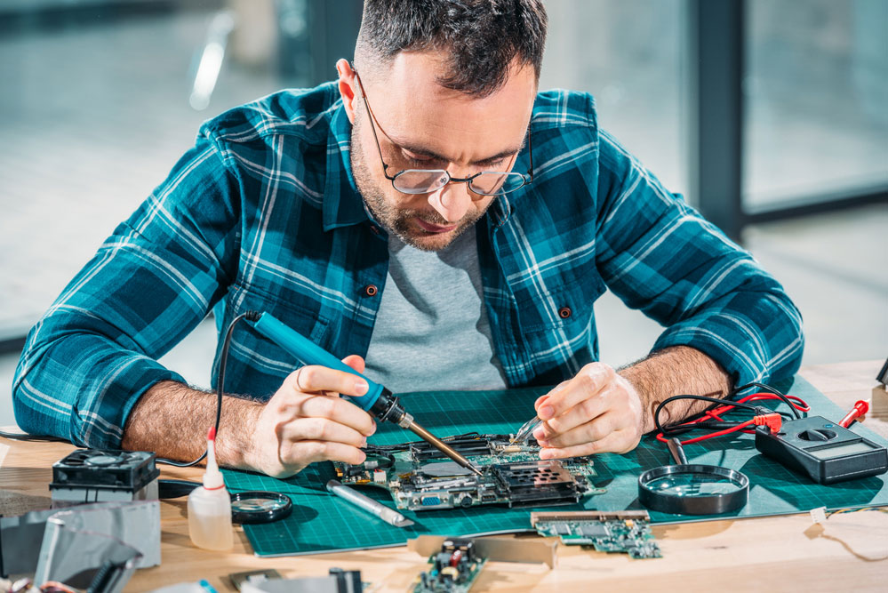 A small soldering iron is the best for delicate electronics projects