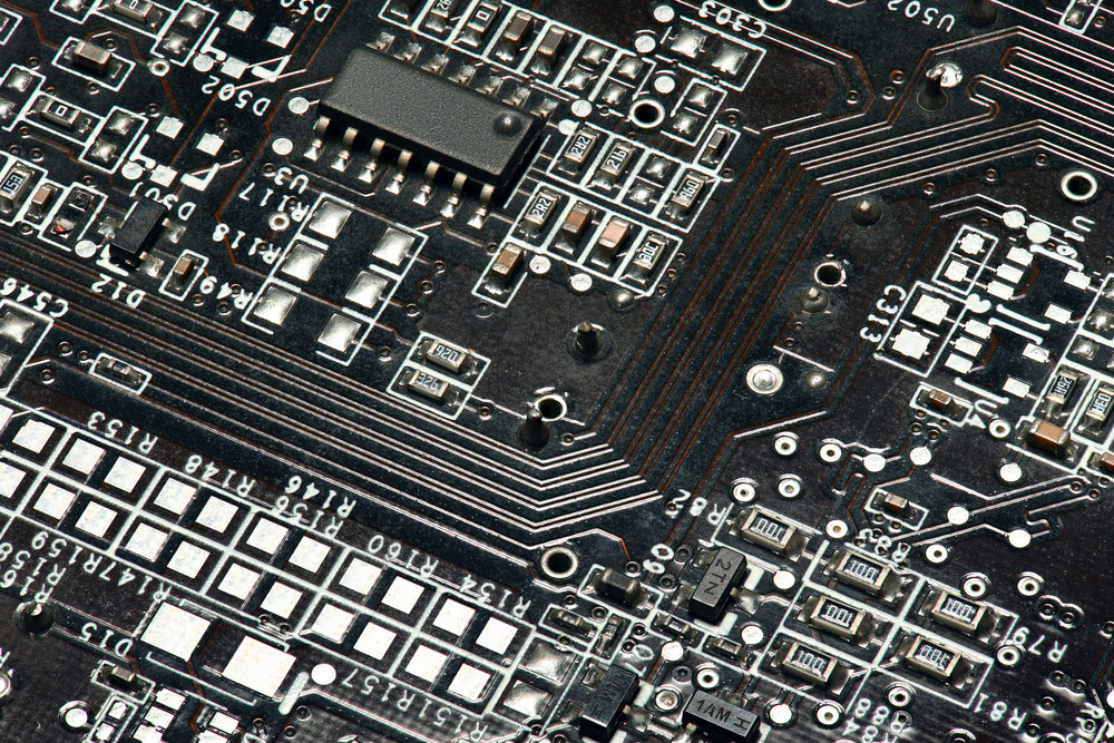 A Printed circuit board and microchip, or CPU closeup