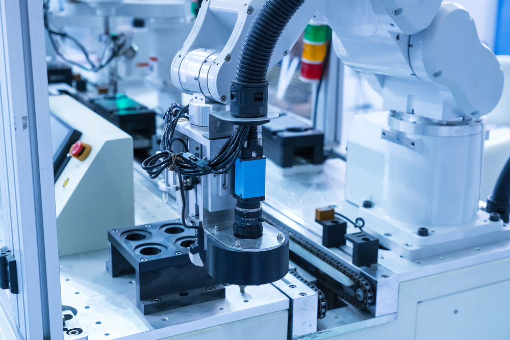 Robotic system for automatic checking of printed circuit boards