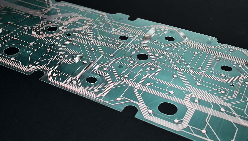 A transparent, flexible keyboard PCB