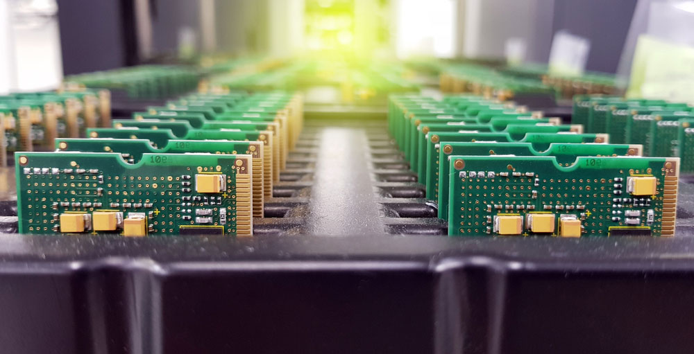 Electronics Manufacturing Services, Assembly Of Circuit Board arrangement, close-up of the raw of PCBA in the tray.