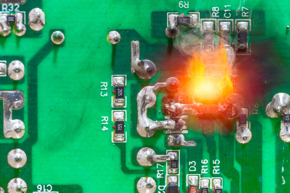 PCB components burning due to short-circuiting fire