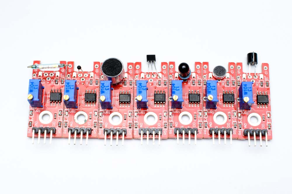 Red PCBs (Arduino modules) with blue potentiometers