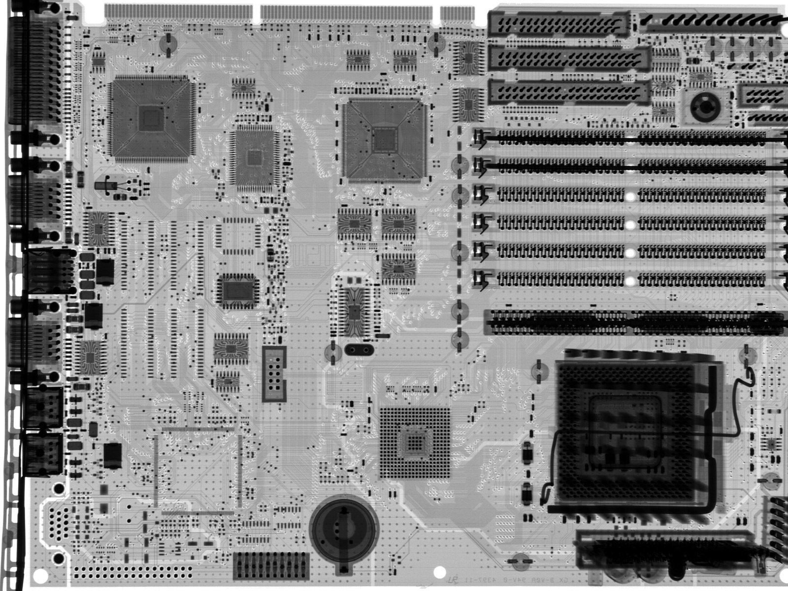 An X-ray image of a motherboard