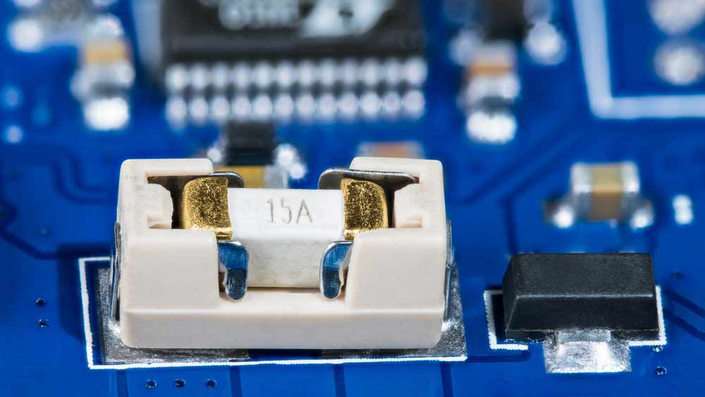 A PCB with a 15-amp surface-mounted fuse