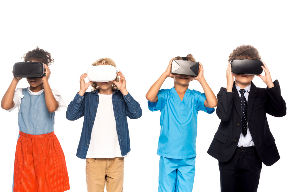 Children wearing virtual reality headsets 