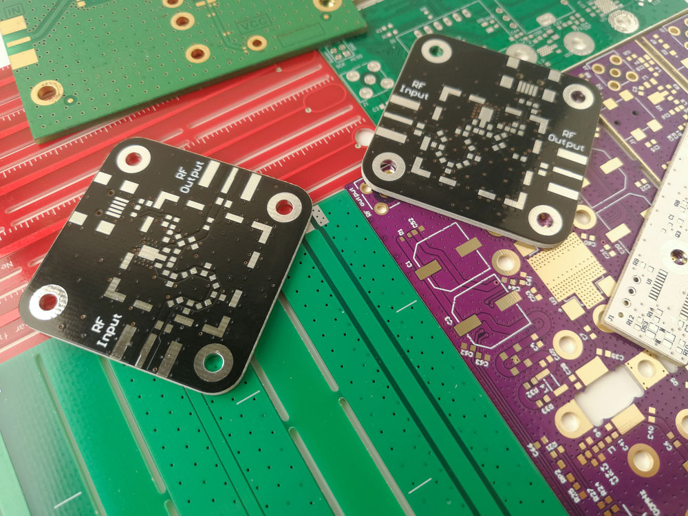 You can create different colored PCBs with the appropriate solder mask color. 