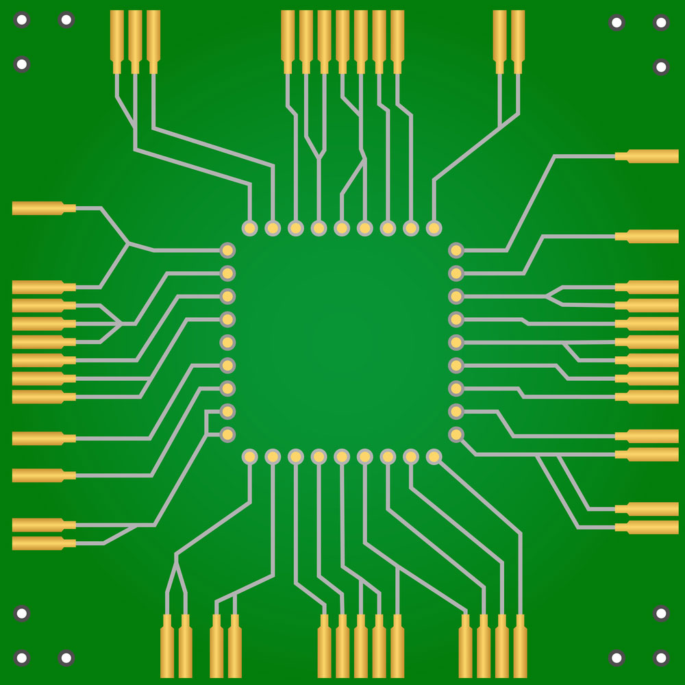 A green PCB with golden connectors