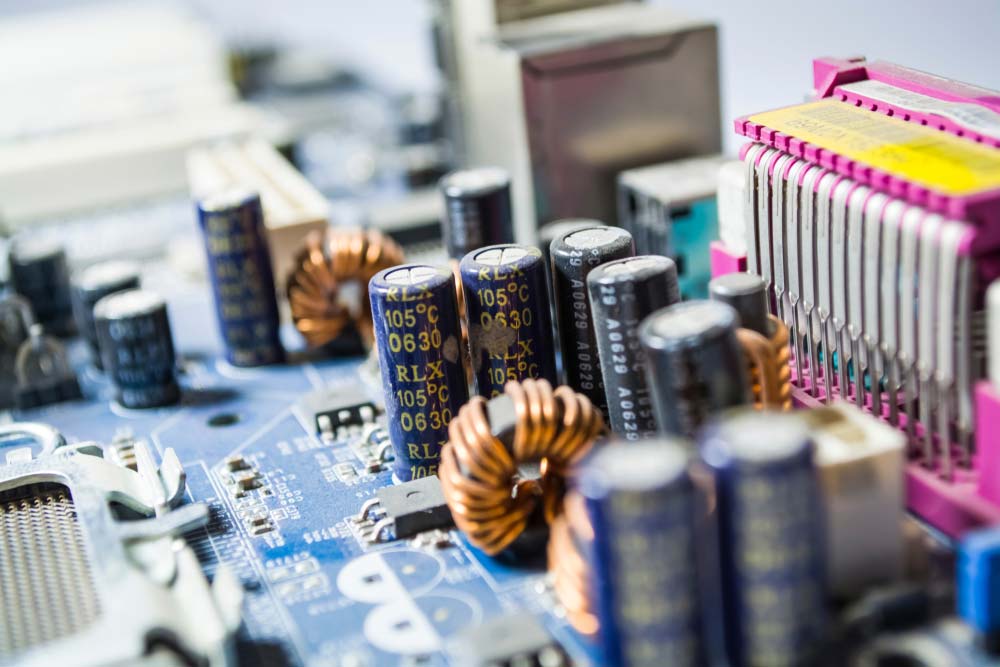 Capacitors mounted on a PCB (note the markings)