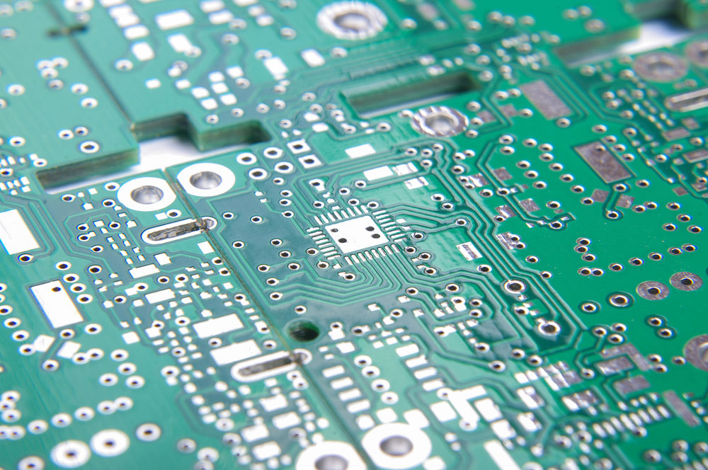 A multilayer printed circuit board with buried vias and other via types