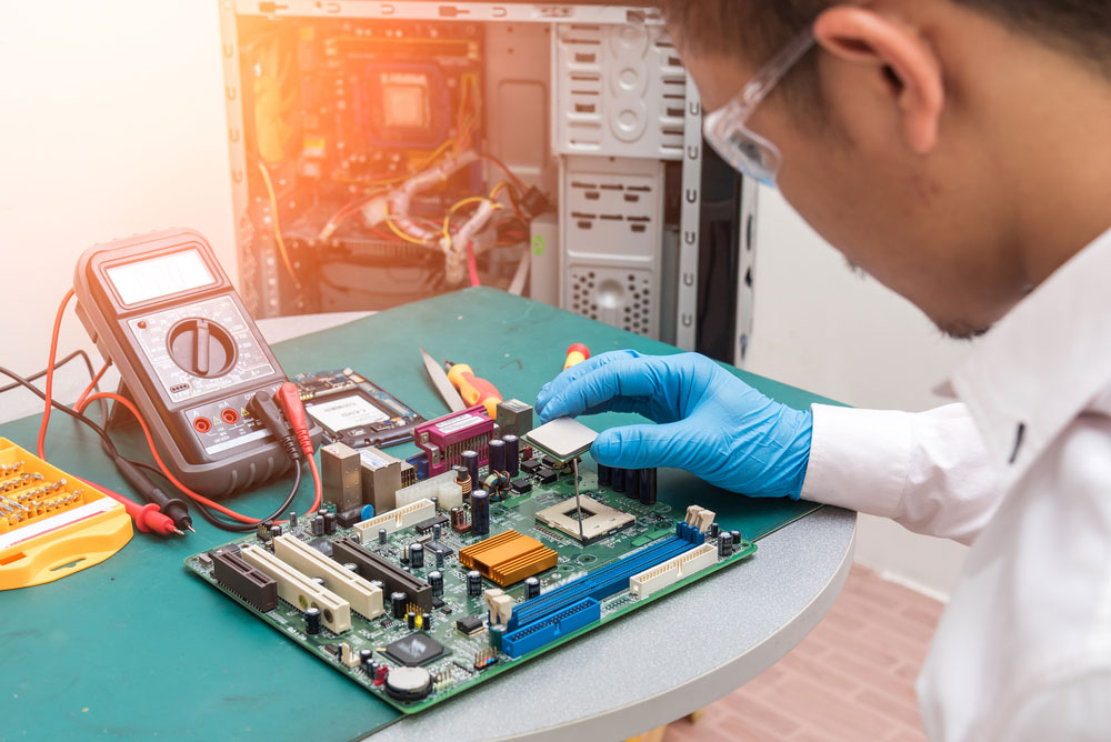 Technician Repairing Oven