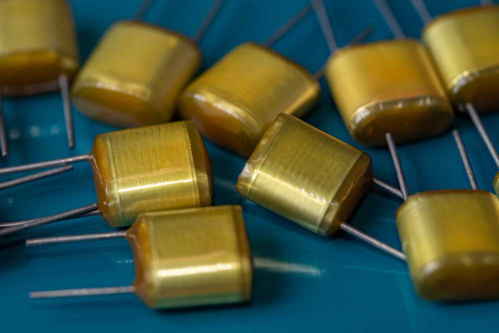 Polyester film capacitors
