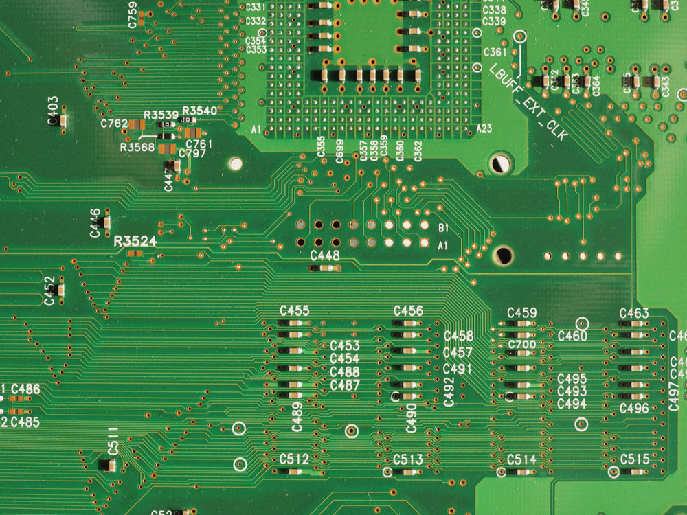 A circuit board with several components attached