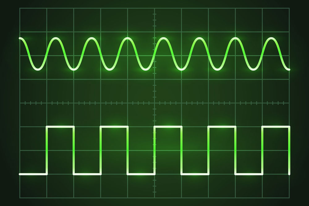 Analog vs. digital signal wave diagrams on an oscilloscope