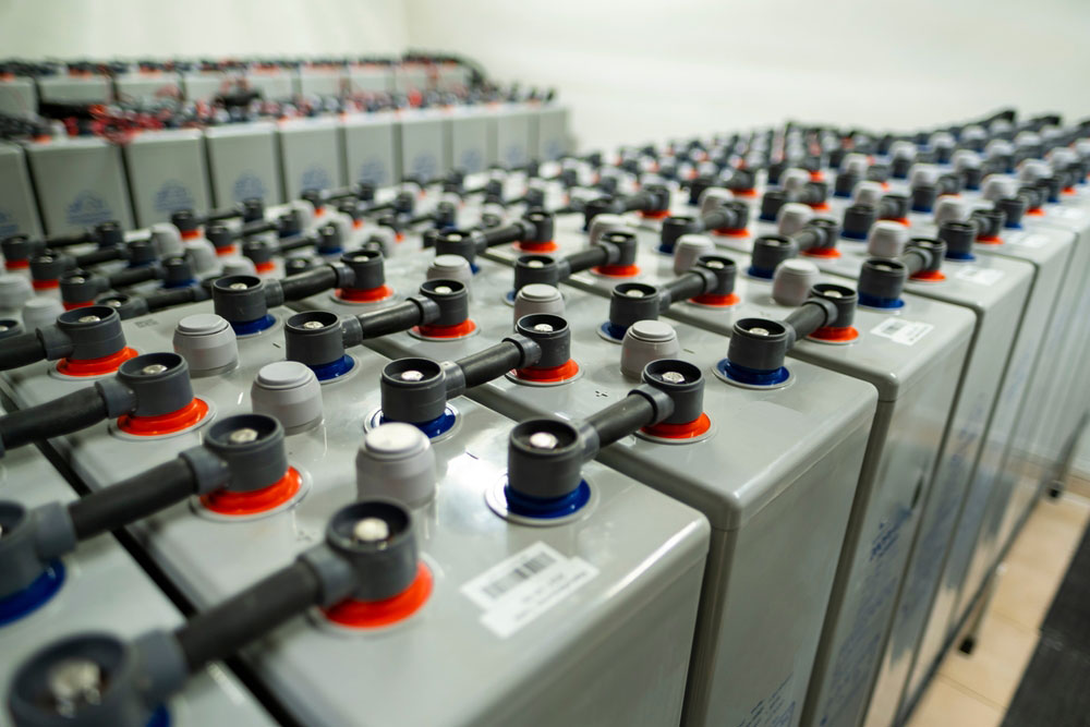 Multiple large-capacity batteries in a green energy plant. Such a unit requires a battery management system.