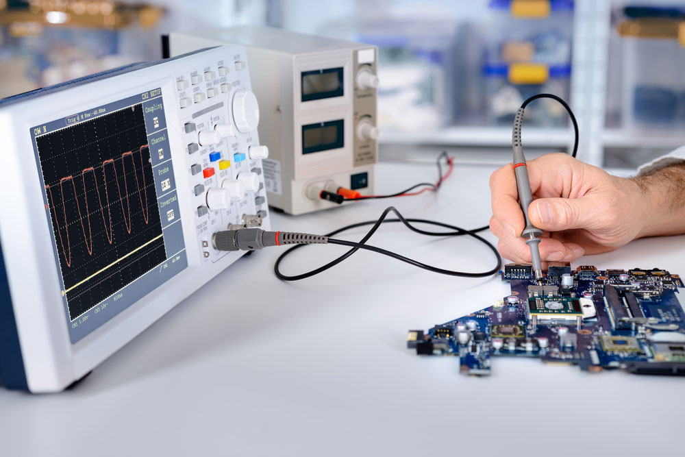 A technician fixing a motherboard