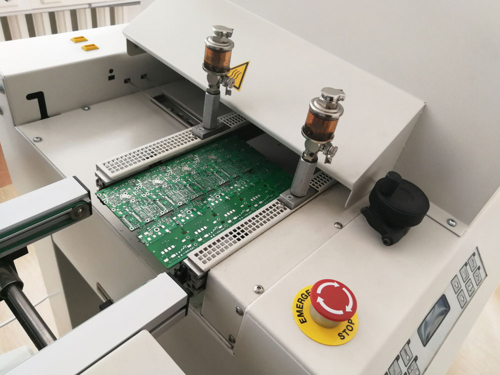 A PCB in a reflow oven machine to heat up the solder paste