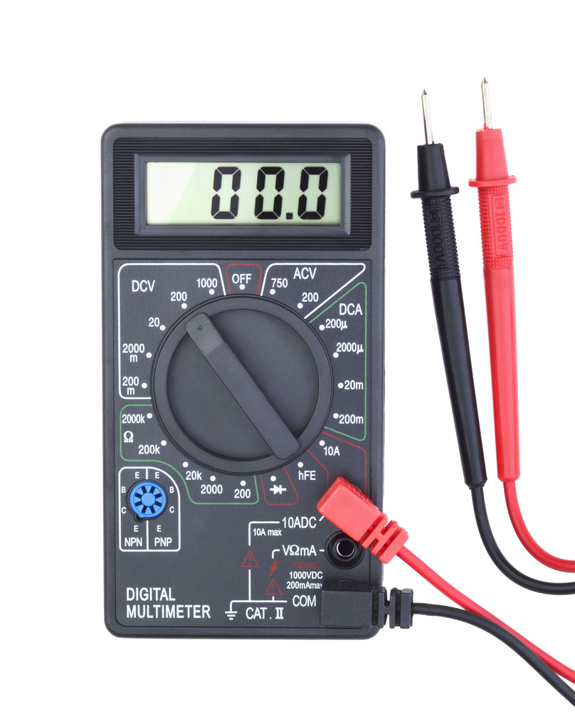 A digital multimeter set to measure DC voltage